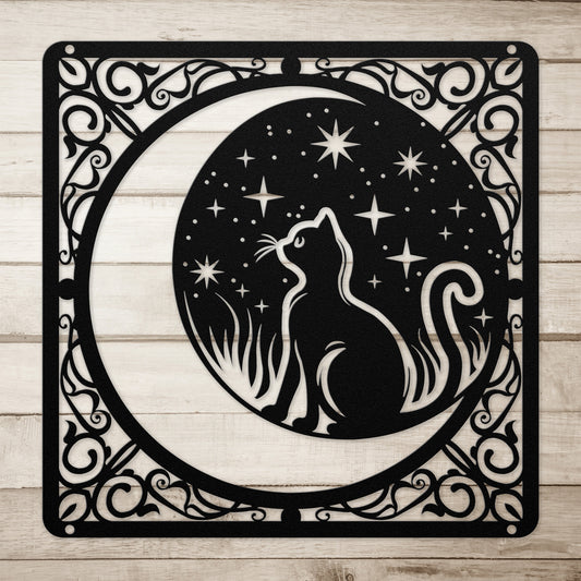 A black home decor metal sign of a cat inside a crescent moon next to a field of stars. All of this is bordered by floral vines.