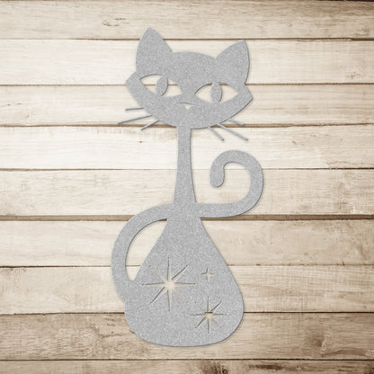A black atomic cat metal wall art on a simple wood plank background.